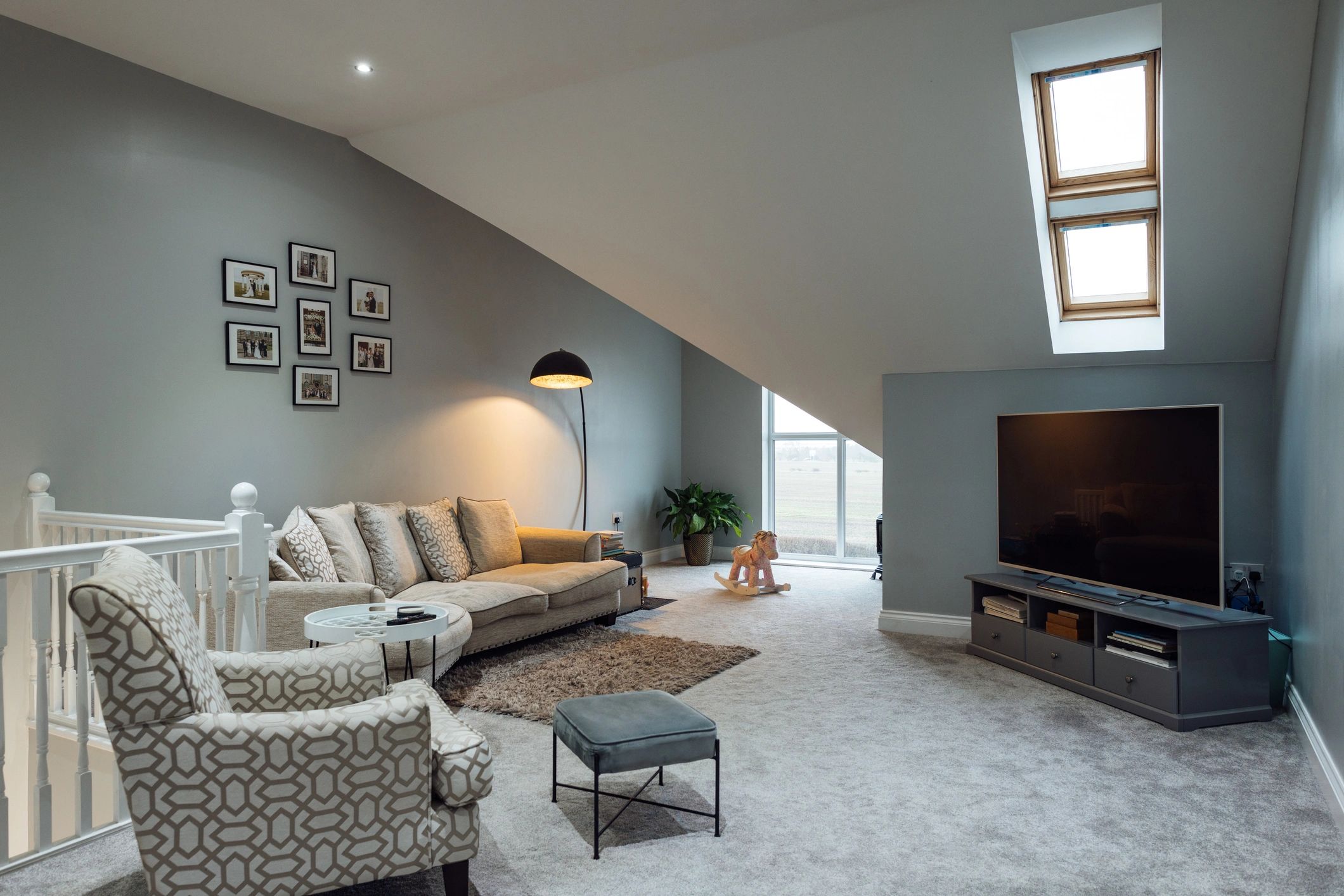 Comfortable media room with TV and seating for simple everyday home theater control