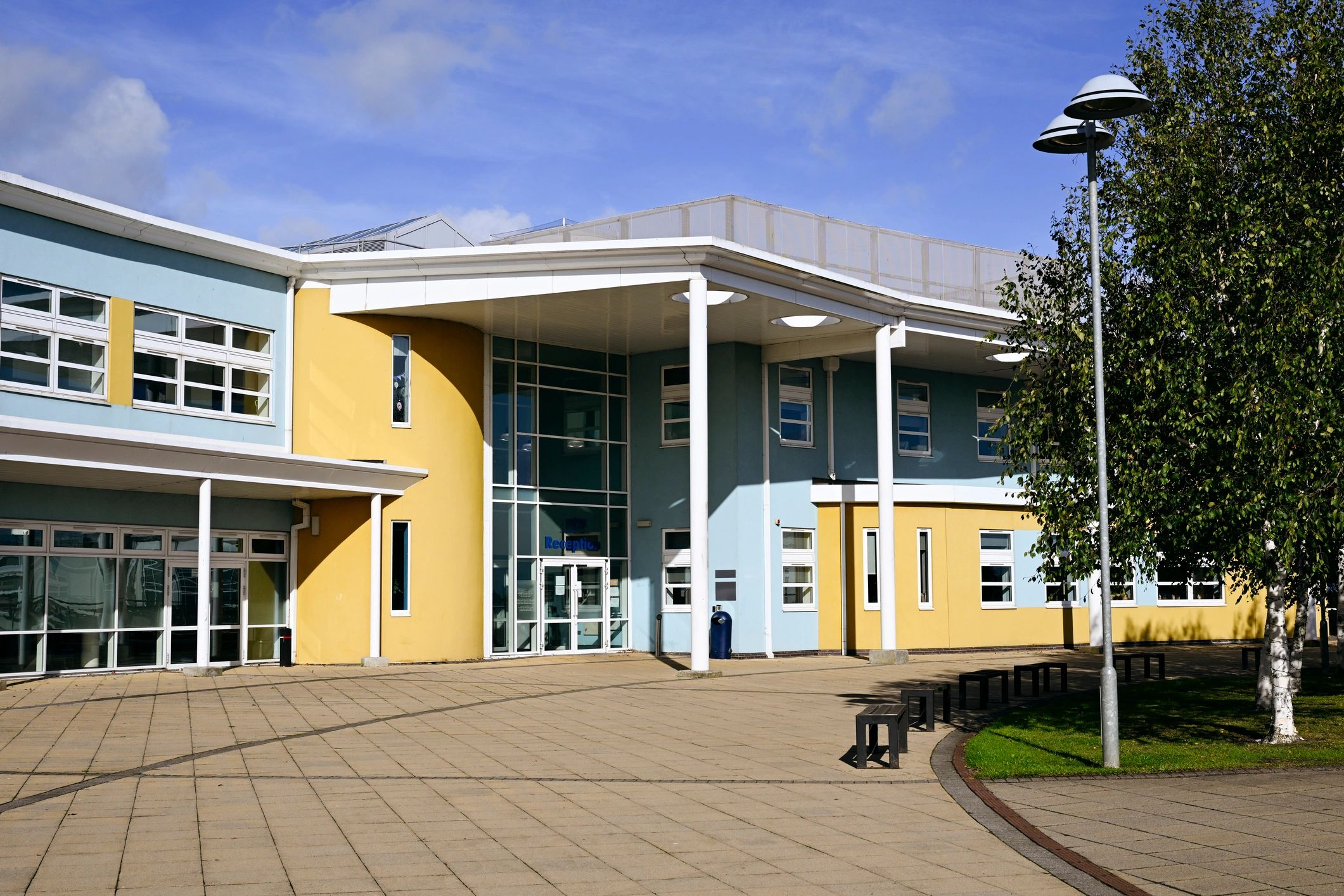 Building exterior representing commercial security camera coverage for businesses