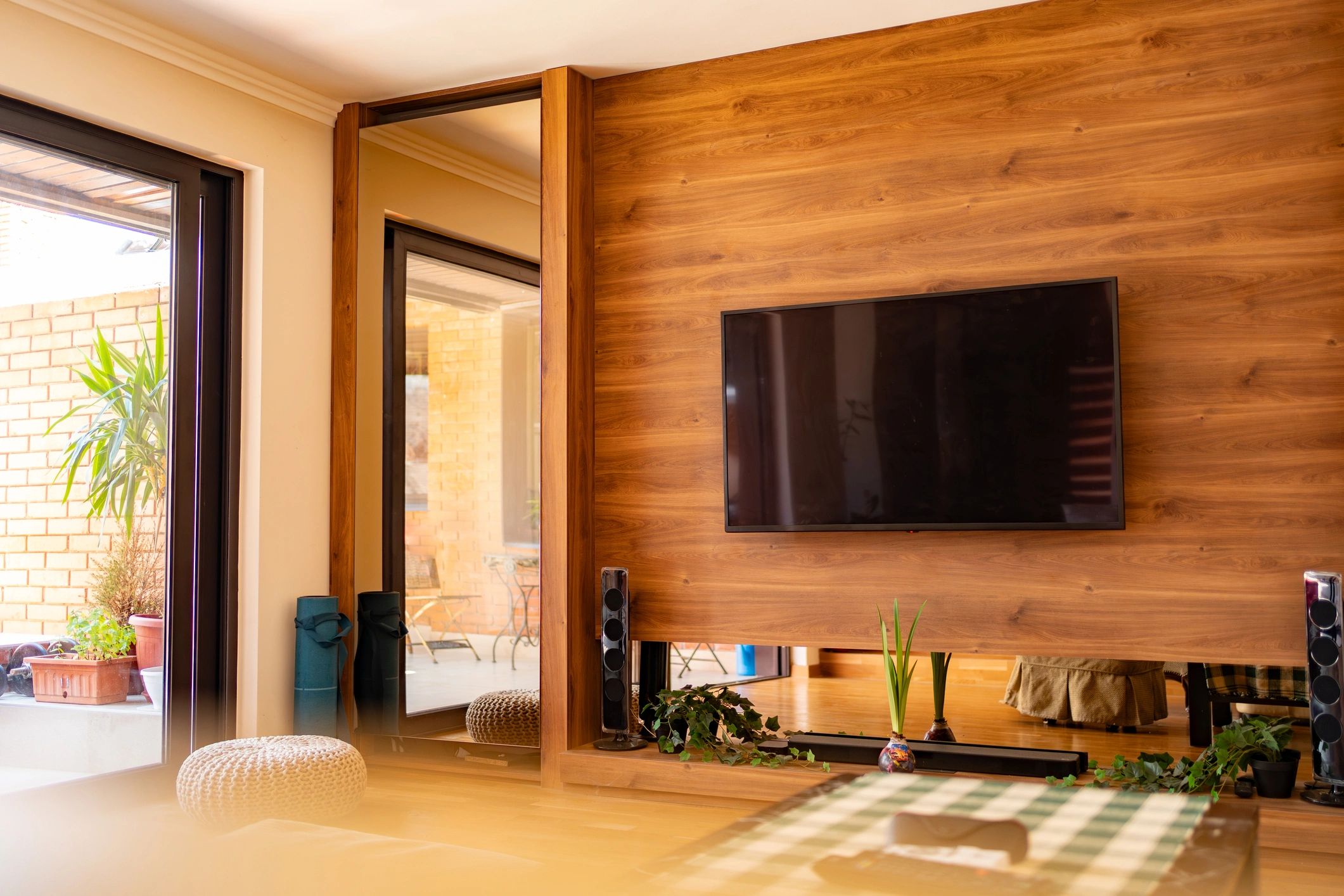 Wall-mounted TV installation in a clean modern living room
